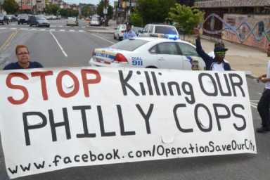 VIDEO: Prayer warriors battle violence on Philly streets