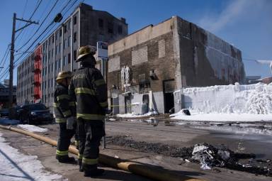 Fire rages through Kensington building, interupts El