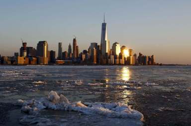 Eastern U.S. bitter cold snap brings pain, grimaces and wonder