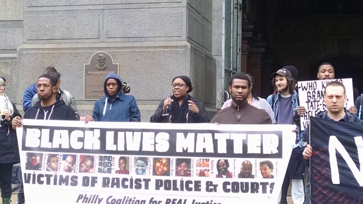 #BlackLivesMatter. Police protesters demand charges dropped