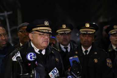 Murdered officer was killed by suspects shooting at him from both sides