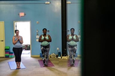 Hip-hop yoga with a beat hits North Philly