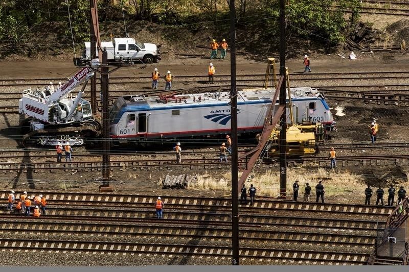 Amtrak engineer in May 12 derailment was not on phone: NTSB