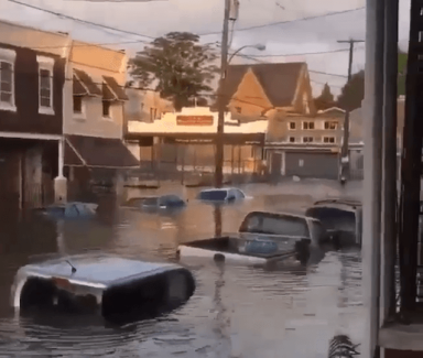 Community cleans up after main break floods West Philly block