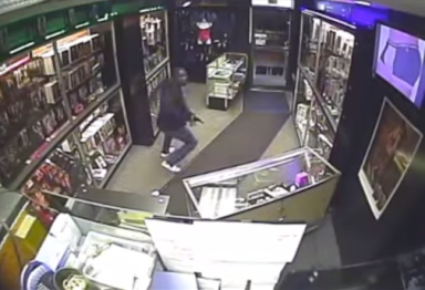 Center City porn store employee fight back against armed assailant, gets shot