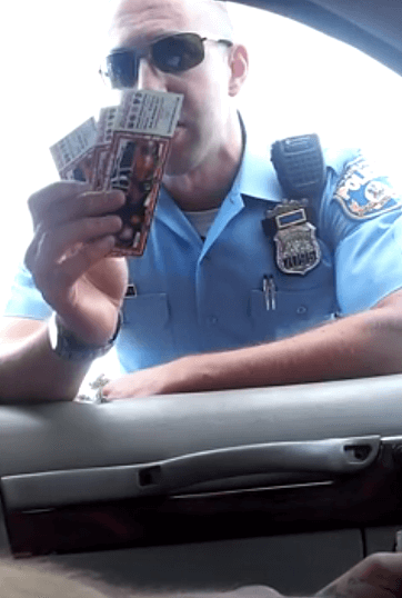 Video: ‘Either you buy these tickets, or I take your car’