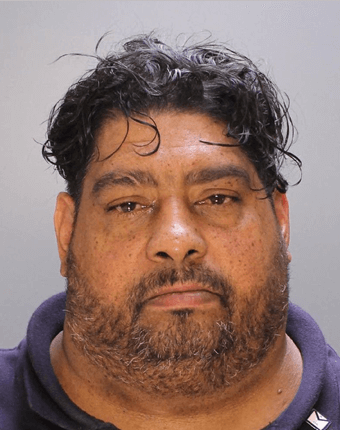 Director of unlicensed funeral home is charged after decomposing bodies found