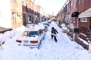 Photos: Philly digs out, trapped drivers outraged, kids throw snowballs