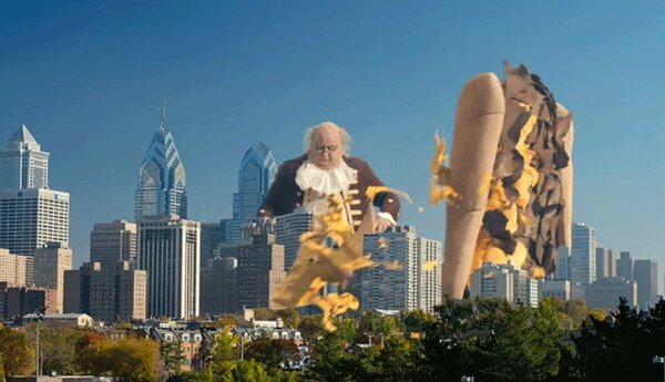Visit Philadelphia ad pits giant Ben Franklin against cheesesteak, provokes