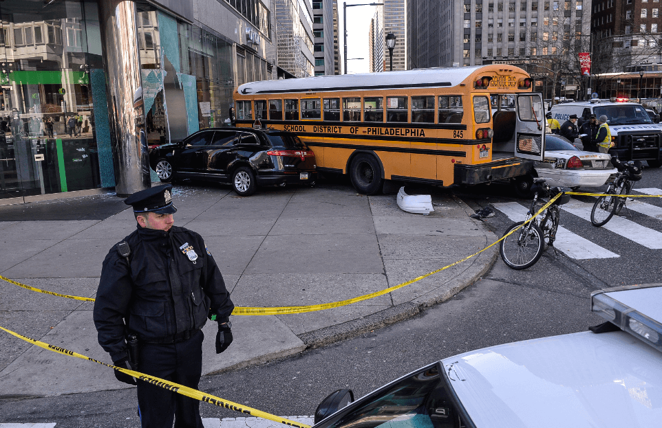 School bus crashes into Center City bank