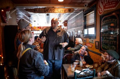 Brash small-town mayor John Fetterman makes case for Senate in Philly