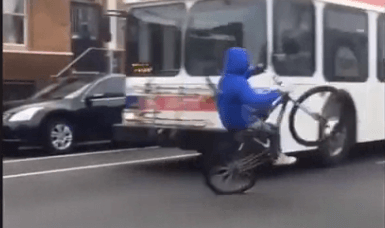 Stunt cyclist comes dangerously close to SEPTA bus: Video