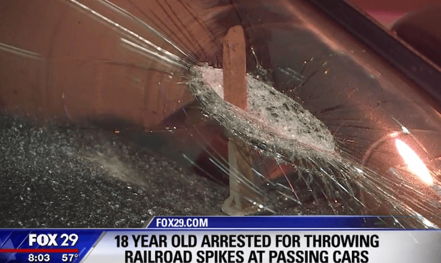 Teen charged with throwing railroad spikes from overpass at cars