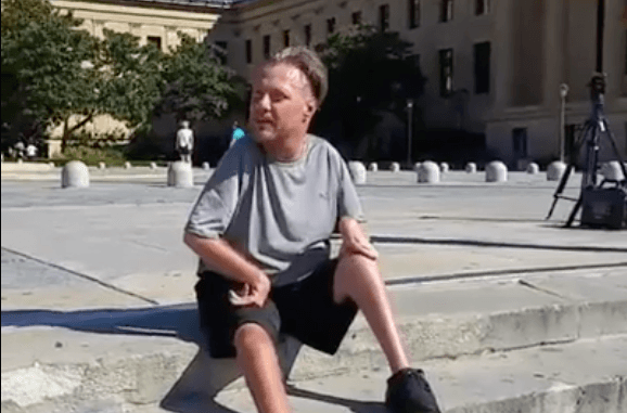 Man with disability summits Rocky Steps