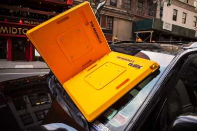 Giant windshield cover could replace the parking boot