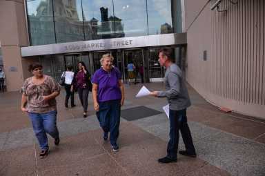 Philly defense attorney takes to streets to protest bank