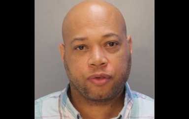Philly cop accused of shooting son in dispute over car