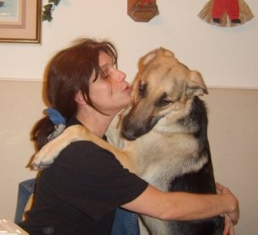 Woman says her dog was only protecting home when fatally shot by officer