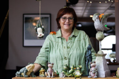 London Grill owner Terry Berch McNally shows a bit of her frog collection.  Kaitlyn Moore