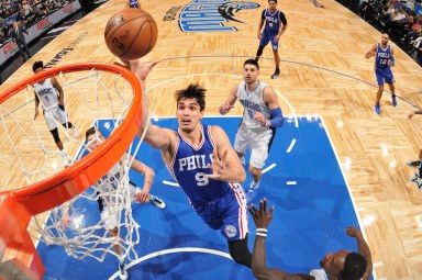 76ers forward Dario Saric drives to the hoop against the Orlando Magic.