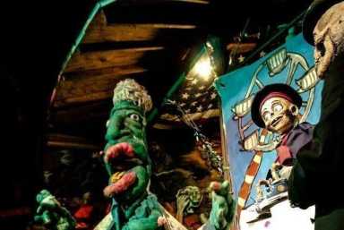 The Squidling Bros. bring “Carnivolution” to colorful life in the backyard of the Tiberino Museum in Powelton Village. | Aalisasa Mille