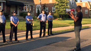 Black Lives Matter protesters rally at home of officer involved in fatal