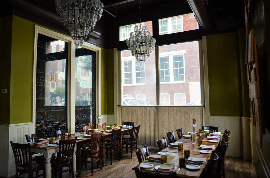 Osteria has a few different event spaces available for holiday parties, including the wine room. | Provided