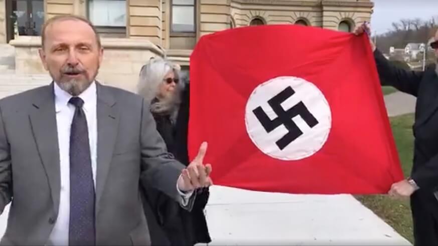 Anti-racist activist on Confederate-Nazi flag burning tour