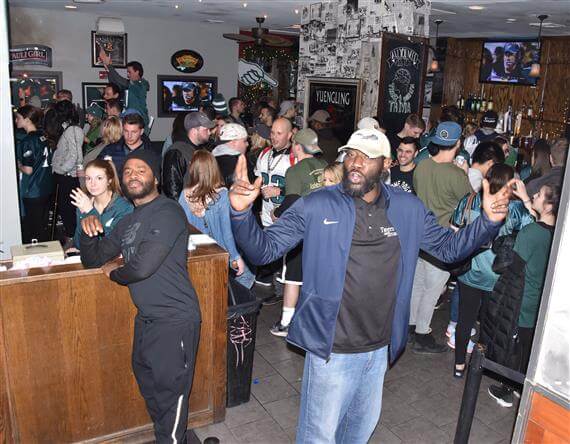 Eagles fans celebrate the big win against the Minnesota Vikings. | HughE Dillon