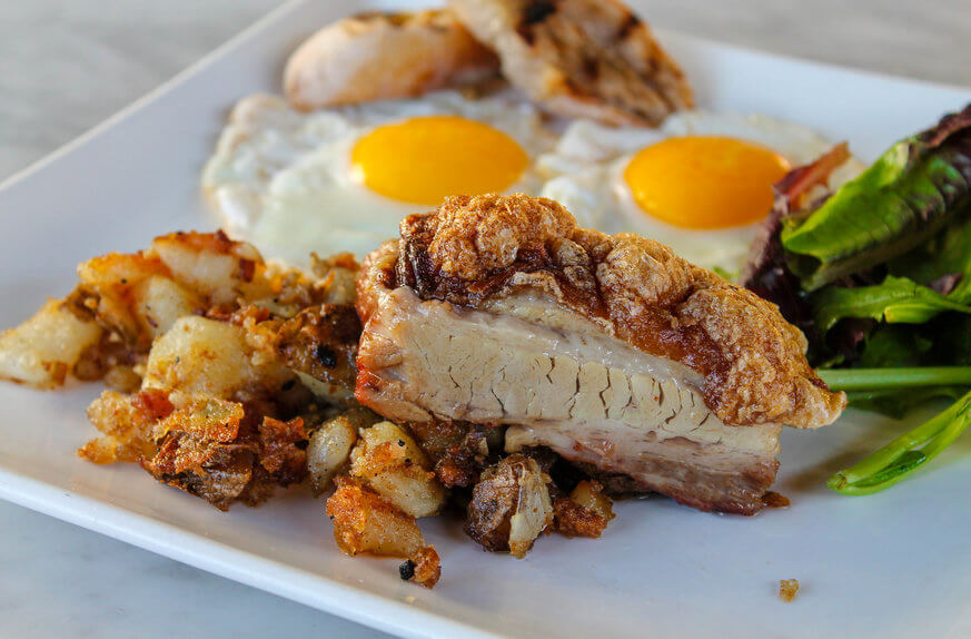 Pork belly and eggs is just one of the 'eggs-cellent' brunch options at Fond. | Provided