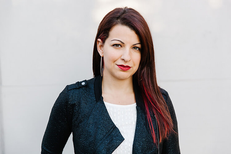Anita Sarkeesian, the executive director of Feminist Frequency, speaks at The Galleries at Moore. | Jessica Zollman