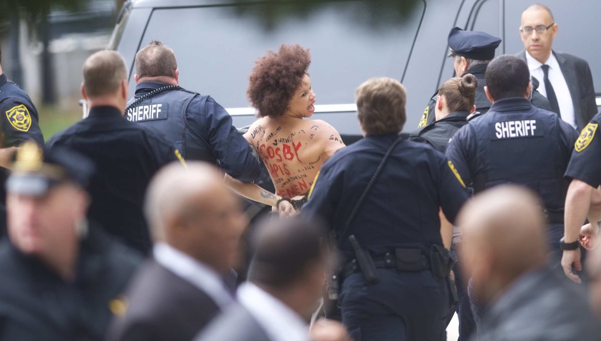 Topless woman who rushed Cosby was formerly on his show