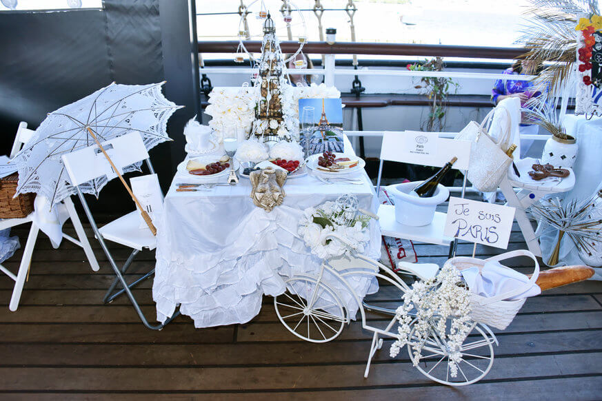 This Diner en Blanc table was inspired by Paris, which is where the annual event got its start. | HughE Dillon