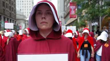 ‘Handmaids’ greet Mike Pence during visit to Philadelphia
