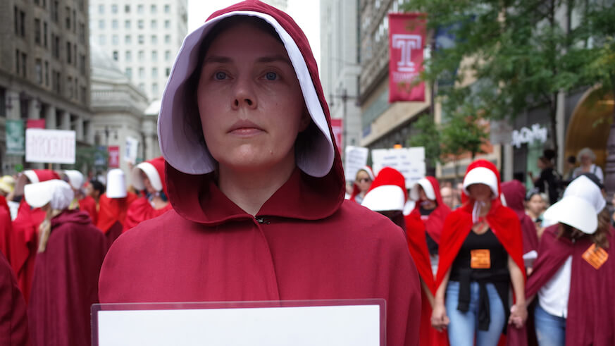 ‘Handmaids’ greet Mike Pence during visit to Philadelphia