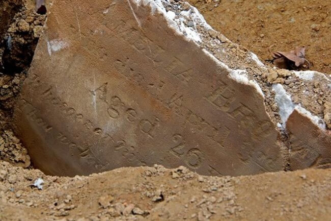 One of the first tombstones found in the Bethel burying ground, where a black baby doll was recently found. Courtesy of Terry Buckalew