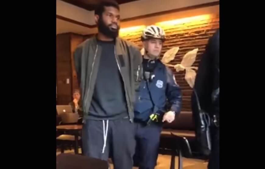 Viral video shows Starbucks arrest of two black men.