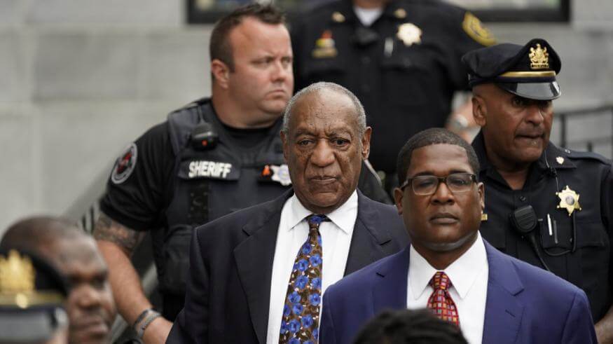 Andrew Wyatt seen escorting Bill Cosby to court. (Photo courtesy Getty Images)