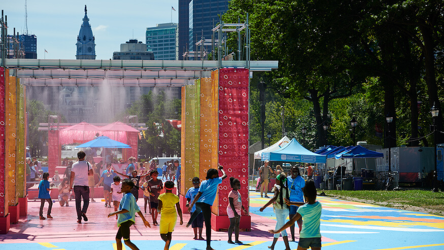 Children play in Fairmount Park during special programming for June