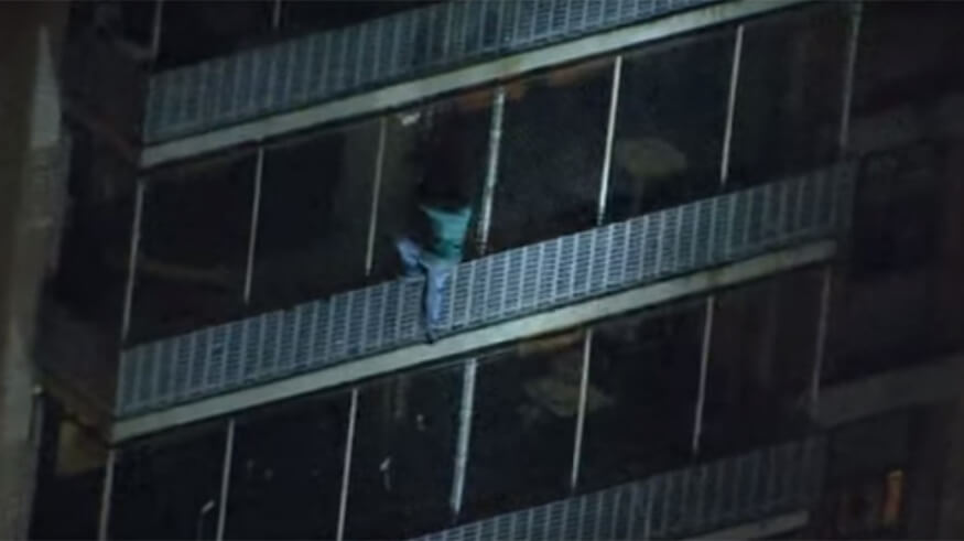 Man escapes high-rise fire by scaling down a 19-story building