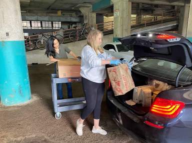 Terry Gao and Juli Debnam Med Students Unloading