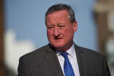 Philadelphia mayoral candidate Jim Kenney departs after greeting supporters outside a senior center on primary election day in Philadelphia