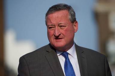 Philadelphia mayoral candidate Jim Kenney departs after greeting supporters outside a senior center on primary election day in Philadelphia