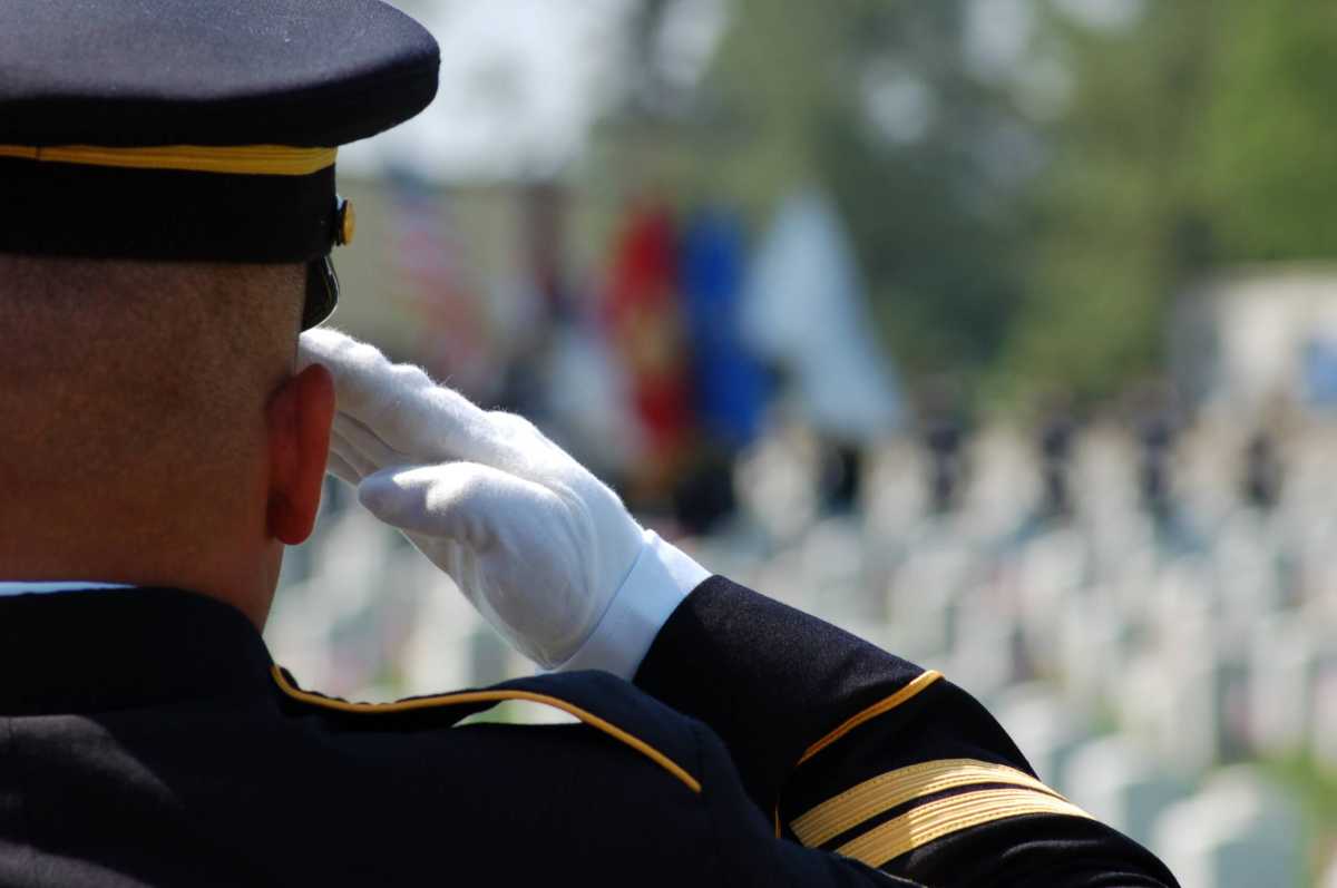 Soldier salutes fallen comrades