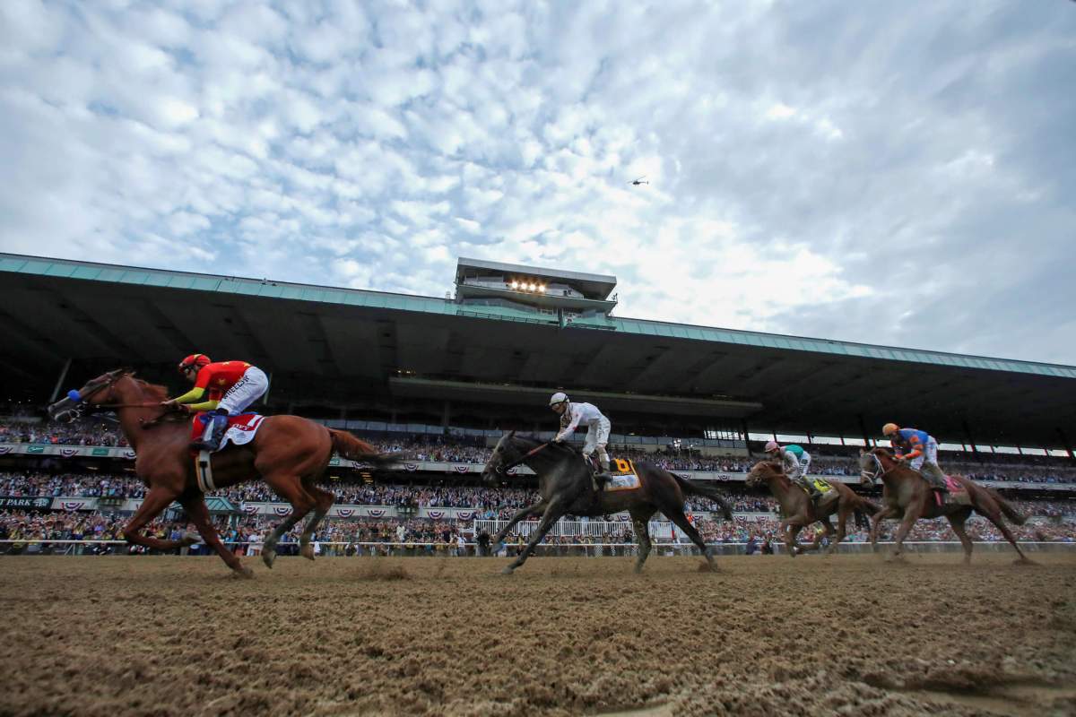 Justify with jockey Mike Smith aboard wins the 150th running of the Belmont Stakes at Belmont Park in Elmont