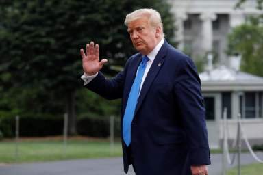 President Donald Trump returns from the Walter Reed National Military Medical Center