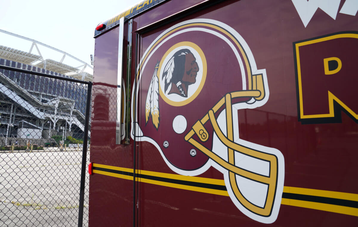 Redskins logo is seen on a vehicle after the team announced they will scrap the name at FedEx Field in Landover, Maryland