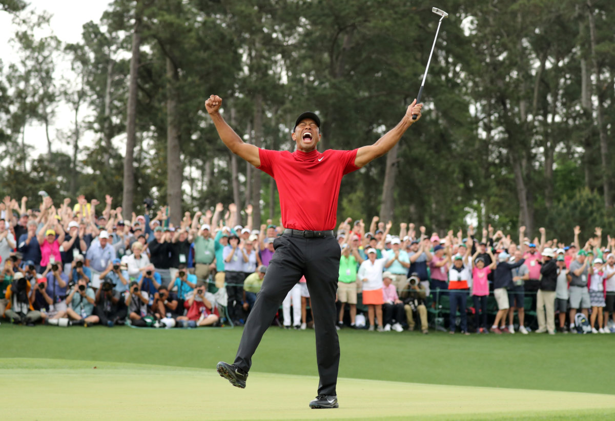 FILE PHOTO: Tiger Woods celebrates victory at 2019 Masters