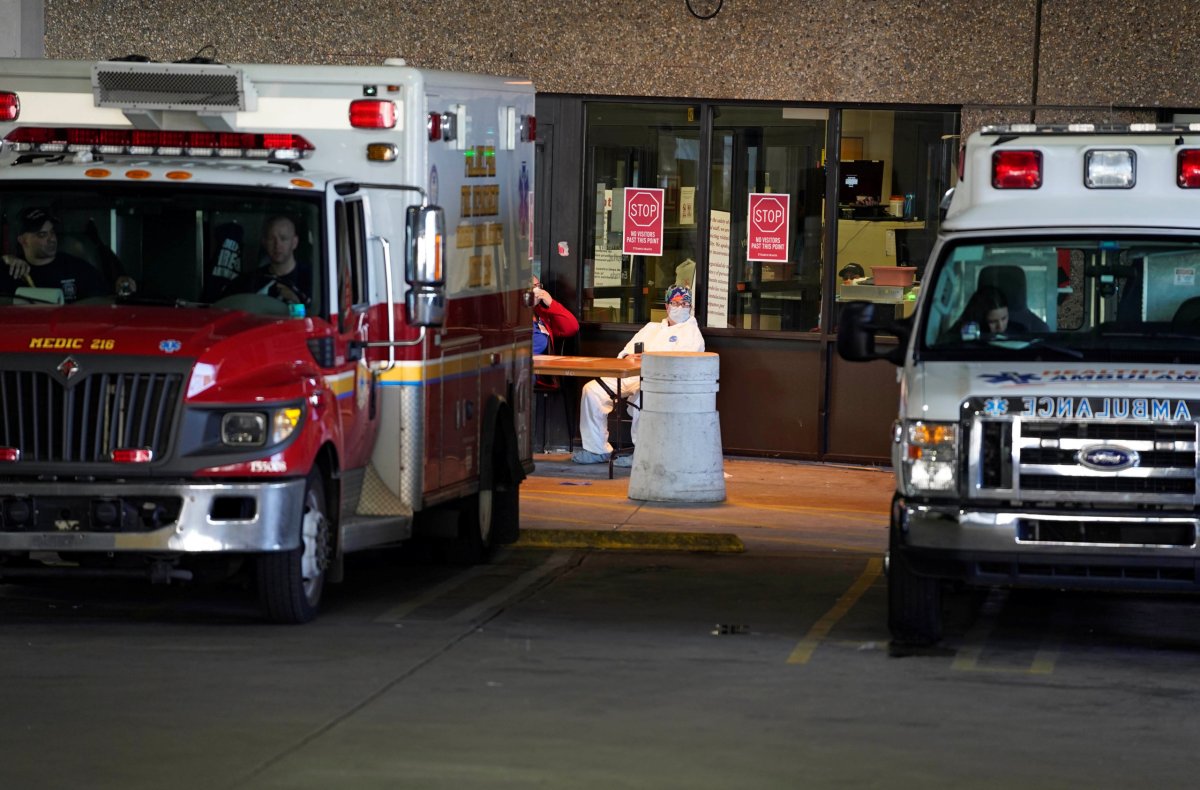 Medical staff wear protective clothing outside Temple University hospital in Philadelphia