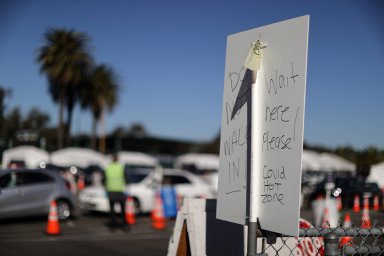 FILE PHOTO: People line up for novel coronavirus tests in LA